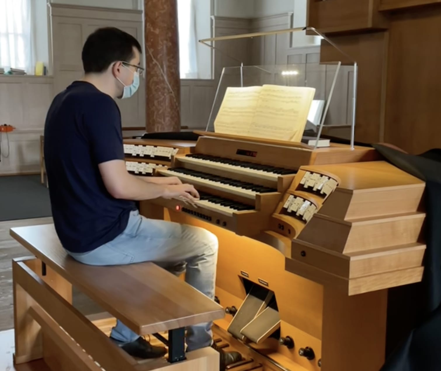 Playing the organ at St. Peter's Church, Zurich